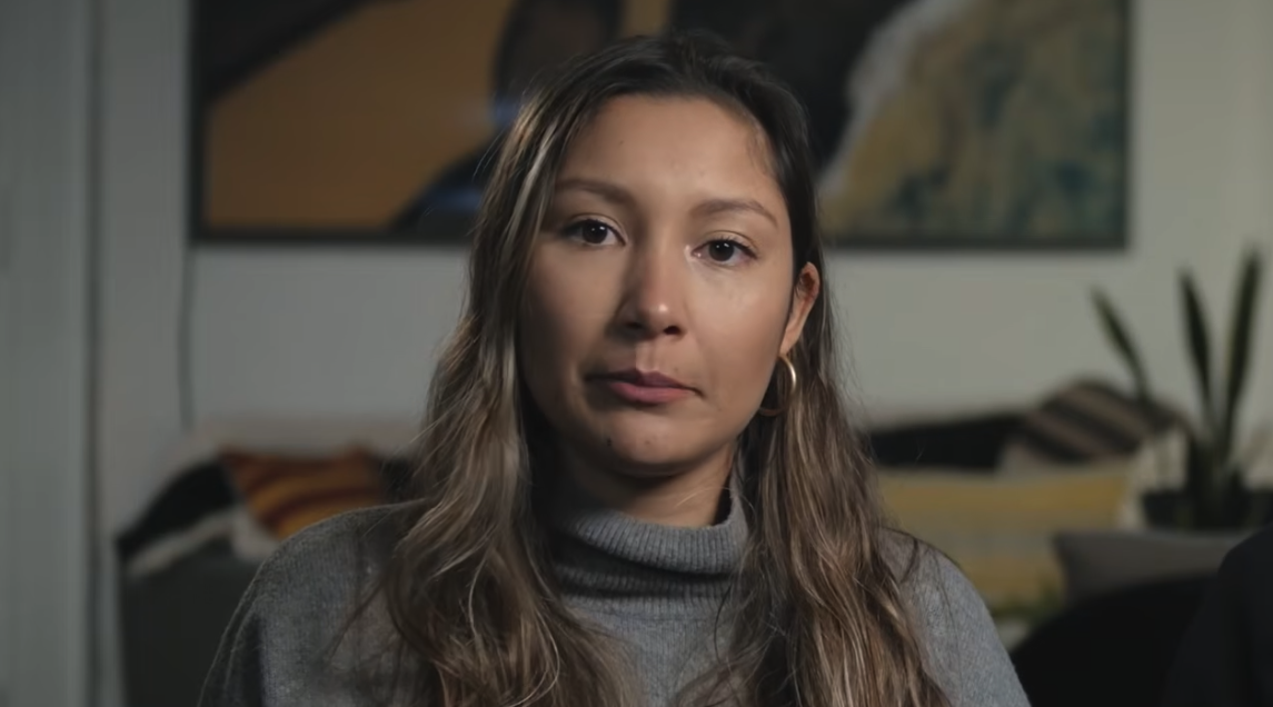 Brianna speaking about her family history of breast cancer in a still from Brianna's Family History of Breast Cancer: Accepting Support